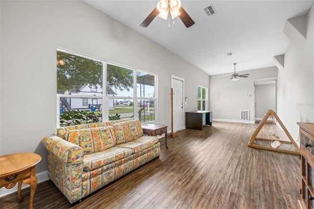 living area featuring ceiling fan, wood finished floors, vaulted ceiling, and baseboards