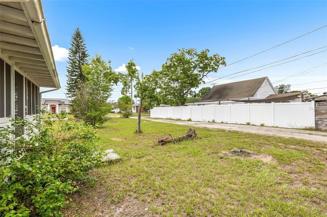 view of yard with a sunroom