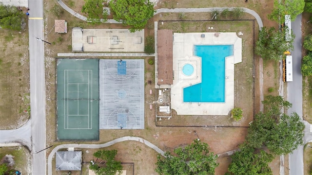 drone / aerial view of a pool