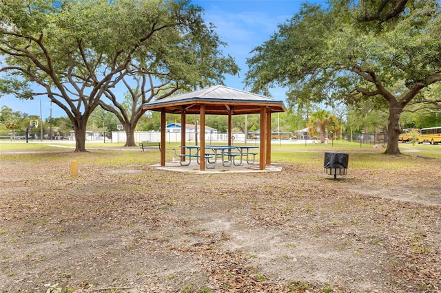 view of community with a gazebo and fence