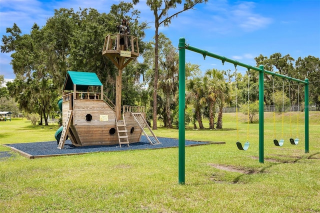 communal playground featuring a yard