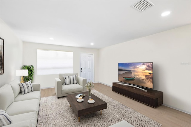 6025 Shore Blvd S Unit 409, Gulfport, FL 33707 - living area with wood finished floors and recessed lighting