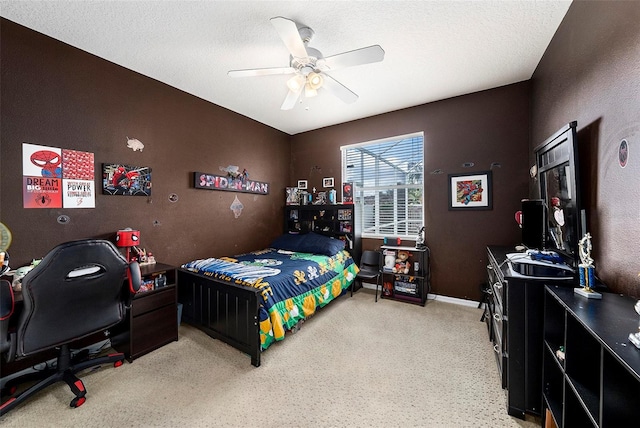 14042 Marlberry Way, Odessa, FL 33556 - bedroom with carpet flooring, a desk, a ceiling fan, a textured ceiling, and baseboards