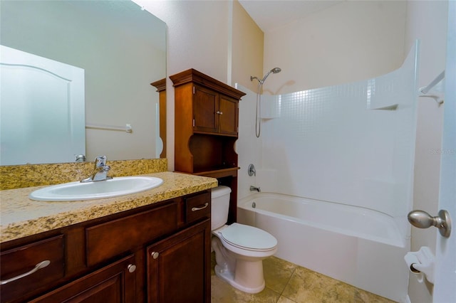 bathroom with toilet,  shower combination, vanity, and tile patterned floors