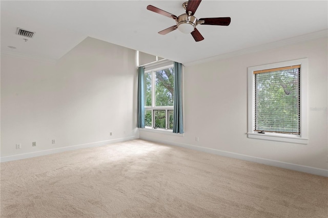 512 S Glen Ave, Tampa, FL 33609 - spare room with crown molding, baseboards, carpet flooring, and ceiling fan
