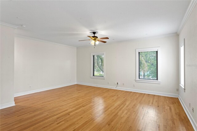 512 S Glen Ave, Tampa, FL 33609 - empty room with a ceiling fan, ornamental molding, light wood-style flooring, and baseboards