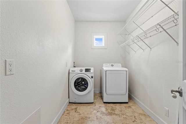 512 S Glen Ave, Tampa, FL 33609 - clothes washing area with separate washer and dryer and baseboards