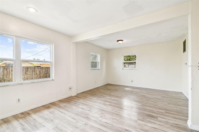 8528 Iris Ave, Seminole, FL 33777 - unfurnished room with wood finished floors and baseboards