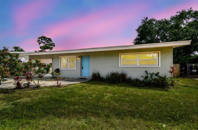 8528 Iris Ave, Seminole, FL 33777 - ranch-style house featuring a lawn