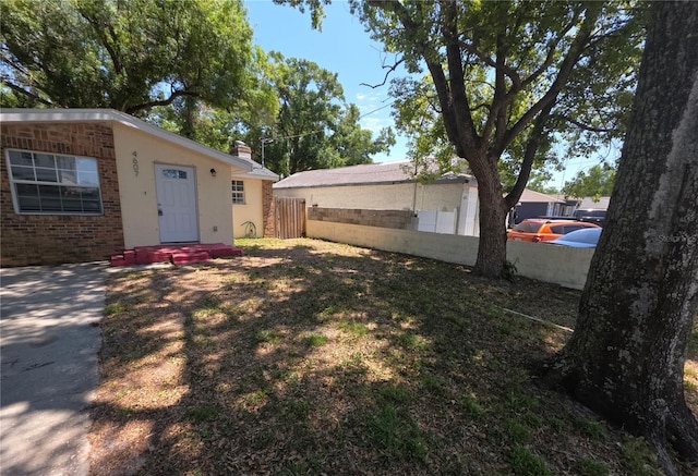 4607 N 35th St, Tampa, FL 33610 - view of yard with fence