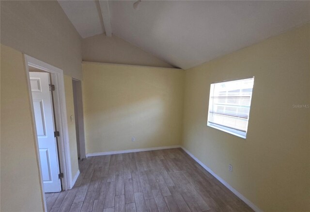 4607 N 35th St, Tampa, FL 33610 - empty room featuring wood finished floors and baseboards