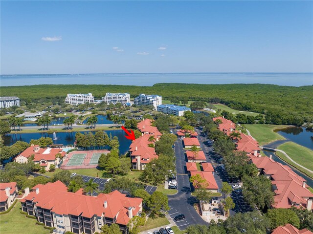 bird's eye view of a large body of water and a golf course