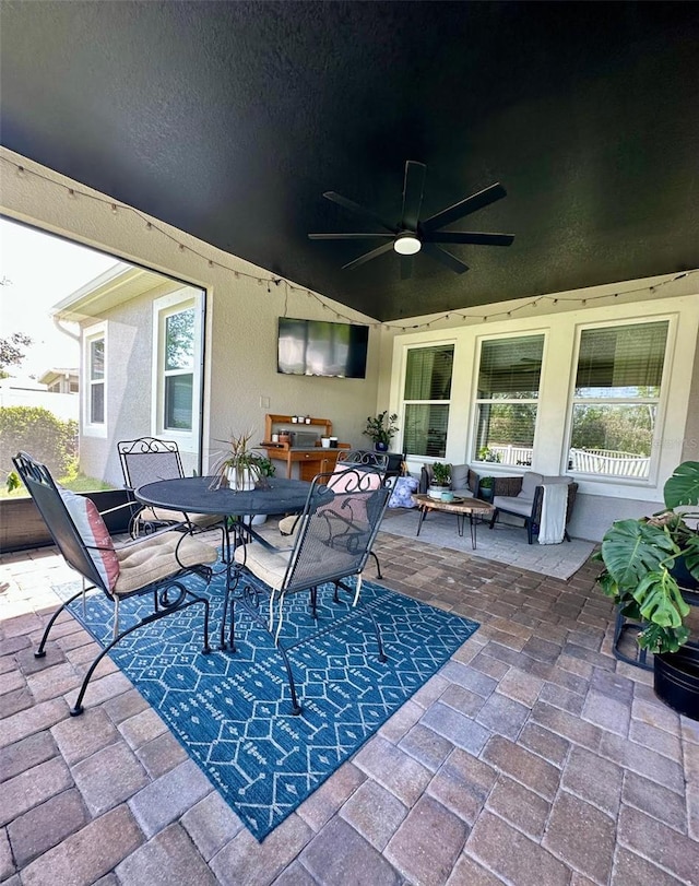 12327 Eagle Swoop Pl, Riverview, FL 33579 - view of patio / terrace featuring a ceiling fan and outdoor dining space