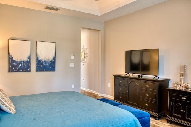 12327 Eagle Swoop Pl, Riverview, FL 33579 - bedroom featuring light wood finished floors and baseboards