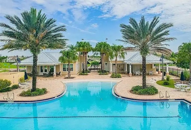 12327 Eagle Swoop Pl, Riverview, FL 33579 - community pool featuring a patio area