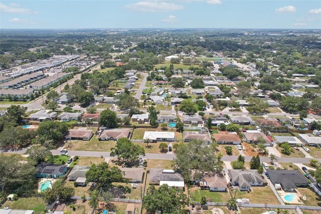 1450 Seabreeze St, Clearwater, FL 33756 - aerial view of property and surrounding area with nearby suburban area