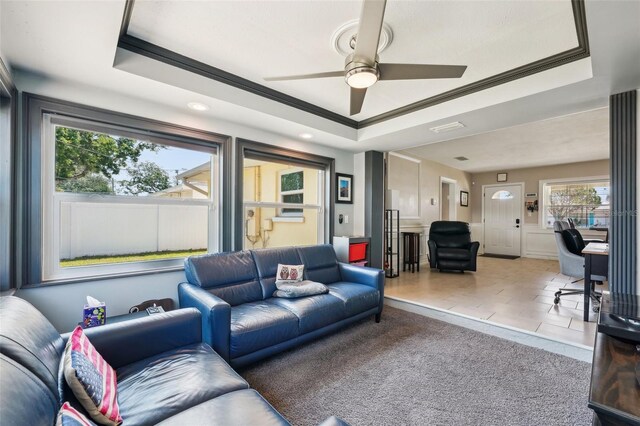1450 Seabreeze St, Clearwater, FL 33756 - living room with a raised ceiling, ceiling fan, tile patterned flooring, ornamental molding, and recessed lighting