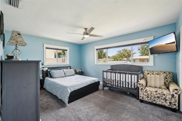 1450 Seabreeze St, Clearwater, FL 33756 - carpeted bedroom featuring a ceiling fan