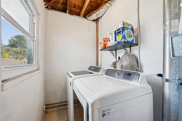 1450 Seabreeze St, Clearwater, FL 33756 - laundry area featuring washer and clothes dryer