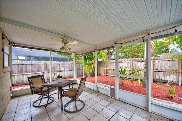 1955 Cobblestone Way, Clearwater, FL 33760 - sunroom / solarium featuring a ceiling fan and outdoor dining area