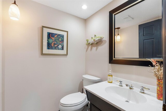 12360 Capri Cir N Unit 106, Treasure Island, FL 33706 - half bath with toilet and vanity