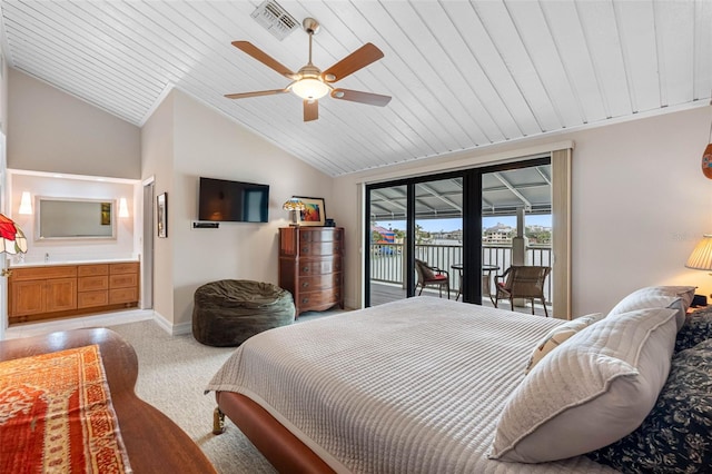 12360 Capri Cir N Unit 106, Treasure Island, FL 33706 - bedroom featuring access to outside, vaulted ceiling, light carpet, baseboards, and wood ceiling