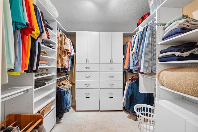 12360 Capri Cir N Unit 106, Treasure Island, FL 33706 - spacious closet featuring light tile patterned flooring
