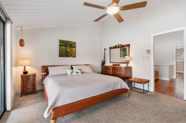 12360 Capri Cir N Unit 106, Treasure Island, FL 33706 - bedroom featuring lofted ceiling, carpet floors, baseboards, and ceiling fan
