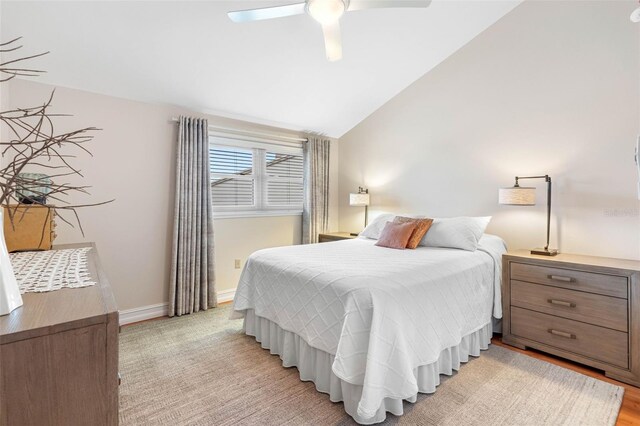 12360 Capri Cir N Unit 106, Treasure Island, FL 33706 - bedroom featuring lofted ceiling, ceiling fan, and baseboards