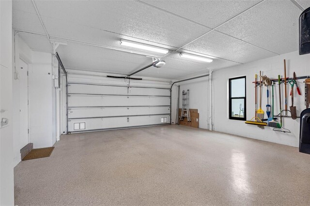 12360 Capri Cir N Unit 106, Treasure Island, FL 33706 - garage with a garage door opener