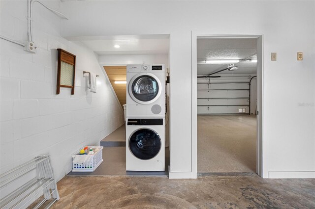 12360 Capri Cir N Unit 106, Treasure Island, FL 33706 - laundry area with estacked washer and dryer