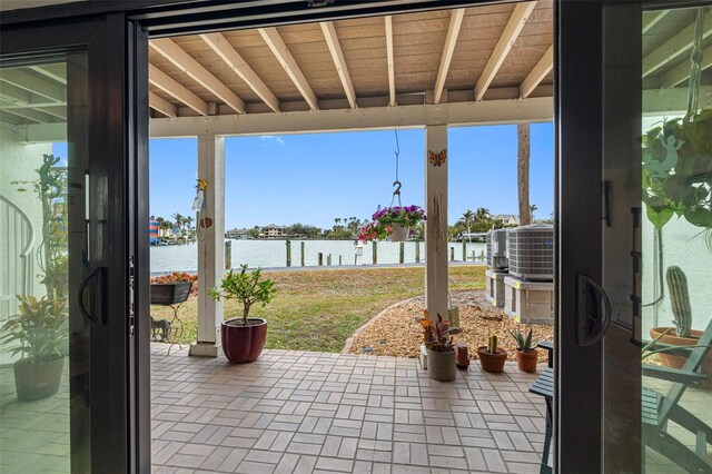 12360 Capri Cir N Unit 106, Treasure Island, FL 33706 - view of patio with a water view