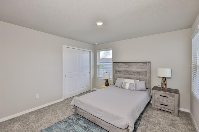 7709 Imagination Pl, Wesley Chapel, FL 33545 - carpeted bedroom featuring baseboards and a closet