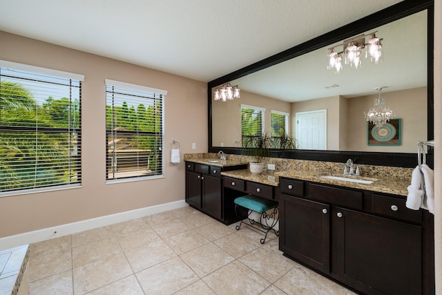 4611 Grand Preserve Pl, Palm Harbor, FL 34684 - full bathroom with a chandelier, baseboards, healthy amount of natural light, and tile patterned floors
