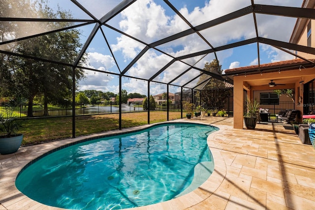 4611 Grand Preserve Pl, Palm Harbor, FL 34684 - swimming pool with a patio area, a ceiling fan, a water view, and a lanai