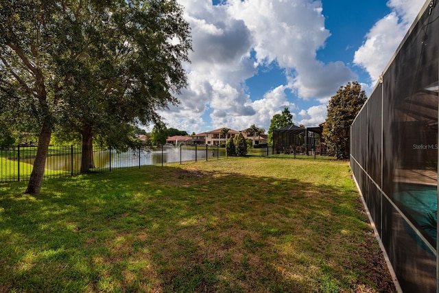 4611 Grand Preserve Pl, Palm Harbor, FL 34684 - view of yard with a water view and glass enclosure