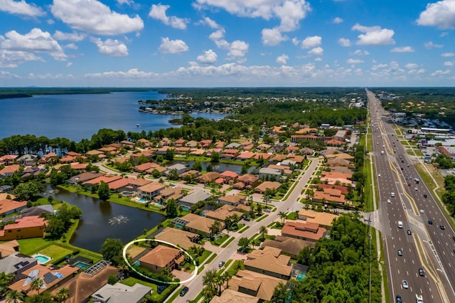 4611 Grand Preserve Pl, Palm Harbor, FL 34684 - aerial perspective of suburban area with a highway and a nearby body of water
