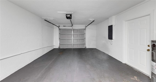 204 Cove Ct, Clearwater, FL 33756 - garage with a garage door opener and electric panel