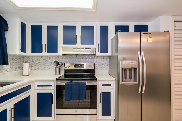 35145 Whispering Oaks Blvd, Dade City, FL 33523 - kitchen featuring appliances with stainless steel finishes, exhaust hood, light countertops, and backsplash