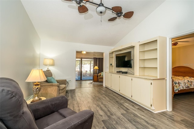 35145 Whispering Oaks Blvd, Dade City, FL 33523 - living room featuring ceiling fan, vaulted ceiling, wood finished floors, and baseboards