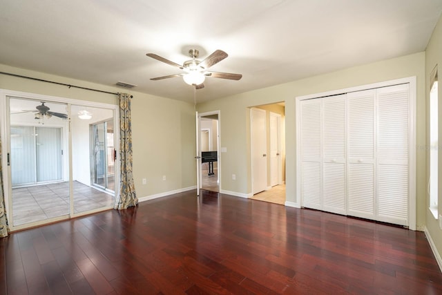 748 Sagewood Dr, Lakeland, FL 33813 - unfurnished bedroom featuring access to exterior, wood finished floors, baseboards, and ceiling fan
