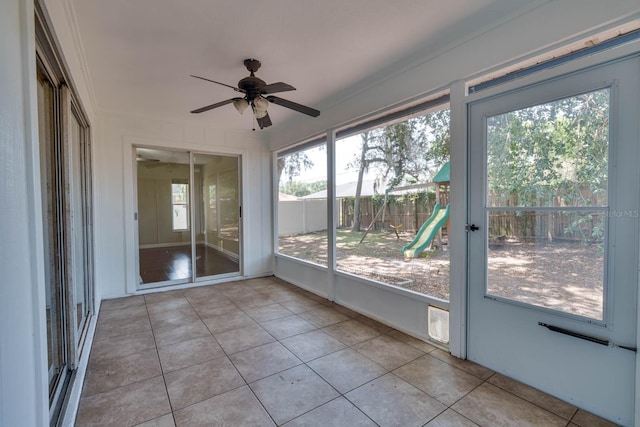 748 Sagewood Dr, Lakeland, FL 33813 - unfurnished sunroom featuring a ceiling fan
