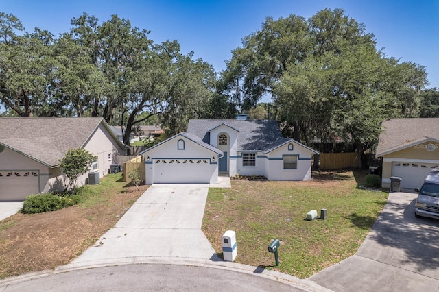 748 Sagewood Dr, Lakeland, FL 33813 - view of front of house with driveway and stucco siding