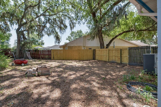748 Sagewood Dr, Lakeland, FL 33813 - fenced backyard featuring cooling unit
