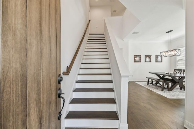 807 W Kentucky Ave, Tampa, FL 33603 - stairs featuring wood finished floors and baseboards