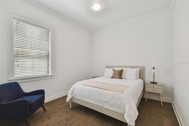807 W Kentucky Ave, Tampa, FL 33603 - bedroom with ornamental molding, wood finished floors, and baseboards