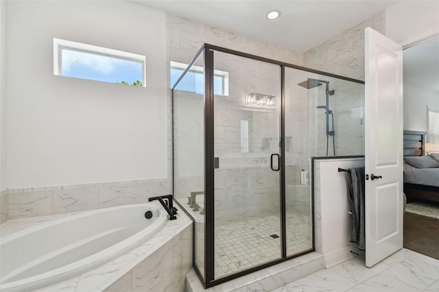 807 W Kentucky Ave, Tampa, FL 33603 - ensuite bathroom with a garden tub, a stall shower, marble finish floors, and recessed lighting