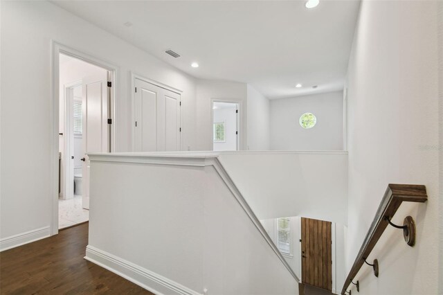 807 W Kentucky Ave, Tampa, FL 33603 - hall featuring an upstairs landing, dark wood-style floors, recessed lighting, and baseboards