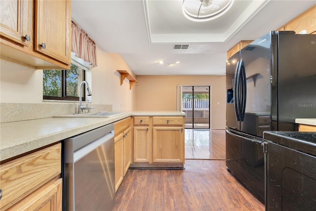 728 Waterbridge Dr, Winter Haven, FL 33880 - kitchen featuring stainless steel dishwasher, a sink, dark wood-style floors, a peninsula, and a raised ceiling