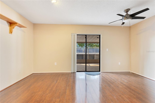 728 Waterbridge Dr, Winter Haven, FL 33880 - spare room featuring wood finished floors, ceiling fan, baseboards, and a textured ceiling